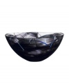 A colorful, abstract print on lead-free crystal lends your home decor modern appeal.