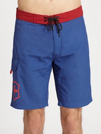 Contrasting waistband adds a splash of color to this all-time beach favorite.Drawstring tie waistSide cargo pocketInseam, about 9NylonMachine washImported Contrasting waistband adds a splash of color to this all-time beach favorite.Drawstring tie waistSide cargo pocketInseam, about 9NylonMachine washImported