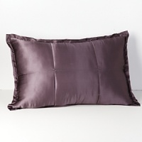 Luxurious 100% silk sham is accented with a tufted border, reversing to cotton sateen. Solid quilted sham. Luxurious 100% silk sham is accented with a tufted border, reversing to cotton sateen. Solid quilted sham.