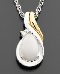 Luminous pear-cut opal (3/8 ct. t.w.) looks fabulous alongside sparkling round-cut diamond accents on this pendant set in 14k gold & sterling silver. Approximate length: 18 inches. Approximate drop: 1/2 inches. Luminous pear-cut opal (3/8 ct. t.w.) looks fabulous alongside sparkling round-cut diamond accents on this pendant set in 14k gold & sterling silver. Approximate length: 18 inches. Approximate drop: 1/2 inches.