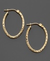 The perfect every day accent for your composed ensemble, these pretty oval hoop earrings are crafted in 14k gold. Approximate diameter: 1/2 inch. Approximate diameter: 3/4 inch.
