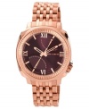 A modern timepiece from Vince Camuto with the handsome pairing of brown and rose.