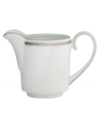 Fresh and cool in crisp white, the Silver Leaf creamer delivers modern style and iconic craftsmanship. Delicate feathered platinum applied using Wedgwood's signature technique shimmers with whimsy on sleek bone china. Fresh and cool in crisp white, the Silver Leaf creamer delivers modern style and iconic craftsmanship. Delicate feathered platinum applied using Wedgwood's signature technique shimmers with whimsy on sleek bone china.