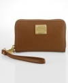 A gorgeous gift for the gadget girl, this luxe leather lovely from Lauren Ralph Lauren is posh and practical. With versatile wristlet strap and slim shape, it discretely slips inside a handbag or can be worn on its own, for a stylish way to stay organized.