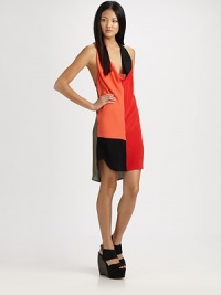 A supple sheath of colorblock silk, finished with a contour hem and shapely racerback.Draped scoopneckSleevelessHem shorter in frontRacerbackAbout 20 from natural waistSilkDry cleanMade in Italy of imported fabric A supple sheath of colorblock silk, finished with a contour hem and shapely racerback.Draped scoopneckSleevelessHem shorter in frontRacerbackAbout 20 from natural waistSilkDry cleanMade in Italy of imported fabric