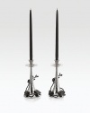 From the Black Orchid Collection. Delicately detailed in cast metal, graceful orchid stems wrap around the tapered hammered base of these striking candlesticks, adding beauty to your table or mantel.Black and polished nickel-plated metal alloyHand-finishedHolds standard tapers (not included) 11HHand washImported