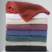 The Lacoste Club towel is a distinguished addition to any bath décor. An oversized ribbed hem provides for a unique design feature and the hollow yarn construction creates a towel with superior softness that lasts. A full range of elegant colors from white and ivory to deep charcoal will certainly impress.