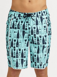 Modern, quick-dry trunks for the beach, board and beyond with with a printed beach-drink design and comfortable knee length. Drawstring waistBack flap pocketsPockets: mesh liningInseam, about 9½PolyesterMachine washImported Modern, quick-dry trunks for the beach, board and beyond with with a printed beach-drink design and comfortable knee length. Drawstring waistBack flap pocketsPockets: mesh liningInseam, about 9½PolyesterMachine washImported