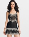 A body skimming sheer lace chemise with flattering floral details all over. Style #814191