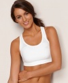 A sports wardrobe essential. This soft, cotton-blend sports bra by Champion offers moisture-wicking support for medium-impact activities. Style #7904