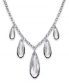 Graceful and gorgeous. With five dangling clear Swarovski crystals in an exclusive cut and embellished by gradated crystal Pointiage, Swarovski's Perfection necklace lives up to its name. Set in silver tone mixed metal. Approximate length: 16 inches. Approximate drop: 2-1/2 inches.