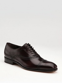 A sartorial standard designed with Italian craftsmanship and perforated detail in brandy calfskin. Leather lining Padded insole Leather sole Made in Italy A sartorial standard designed with Italian craftsmanship and perforated detail in brandy calfskin. Leather lining Padded insole Leather sole Made in Italy