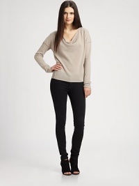 Draped cashmere cowlneck with dropped shoulders and a modern turned-back hem. CowlneckDropped shouldersLong sleevesRibbed hemCashmereDry cleanImportedModel shown is 5'10 (177cm) wearing US size Small. Draped cashmere cowlneck with dropped shoulders and a modern turned-back hem. CowlneckDropped shouldersLong sleevesRibbed hemCashmereDry cleanImportedModel shown is 5'10 (177cm) wearing US size Small.