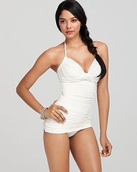 Searing poolside style takes form in this Carmen Marc Valvo swimdress, exuding retro glamour and pure class. Searing poolside style takes form in this Carmen Marc Valvo swimdress, exuding retro glamour and pure class.