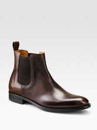 EXCLUSIVELY OURS. A sporty, ankle-high look crafted in Italy from smooth leather with a rubber sole for more comfortable, everyday ease. Leather lining Padded insole Rubber sole Made in Italy EXCLUSIVELY OURS. A sporty, ankle-high look crafted in Italy from smooth leather with a rubber sole for more comfortable, everyday ease. Leather lining Padded insole Rubber sole Made in Italy