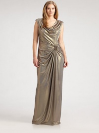 This shimmering, floor-sweeping design features an alluring cowlneck and waist-flattering gathered details, complemented exquisitely by rhinestone beading.CowlneckCap sleevesEmbellishment at gathered waistRuched back detailsBack zipperFully linedAbout 45 from natural waist92% polyester/8% spandexDry cleanImported This shimmering, floor-sweeping design features an alluring cowlneck and waist-flattering gathered details, complemented exquisitely by rhinestone beading.CowlneckCap sleevesEmbellishment at gathered waistRuched back detailsBack zipperFully linedAbout 45 from natural waist92% polyester/8% spandexDry cleanImported