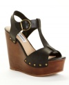 Win Best Dressed every time with the Wyliee wedge sandals by Steve Madden. With bare feet in summer and sexy socks in winter, their T-strap profile with antiqued hardware is perfect.