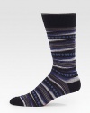 Handsome, woven dress socks printed to perfection in a brightly colored cotton blend.Mid-calf height64% cotton/35% nylon/1% lycraMachine washImported