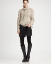 Super sized cables create super style in this luxuriously soft turtleneck that eases into a smooth knit body.Ribbed turtleneck collarLong cable sleeves with ribbed cuffsCable bodiceSmooth bodyRibbed hemAbout 24 from shoulder to hemWool/angora/nylon/elastaneDry cleanImportedSIZE & FITModel shown is 5'9 (175cm) wearing US size Small. 
