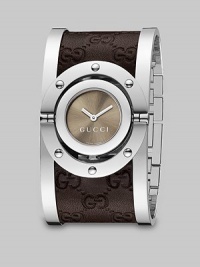 From the Twirl Collection. A modern design featuring a sun-brushed color dial and a stainless steel cuff with brown leather Guccissima inset. Swiss quartz movementWater resistant case to 3 ATMRound stainless steel case, 23mm (0.9)Riveted bezelBrown sun-brushed color dialStainless steel cuff with brown Guccissima leather insetMade in Switzerland 