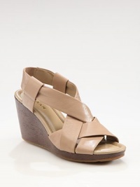 Plethora of smooth leather straps weave across the foot, concluding with a wooden wedge and secure slingback strap. Wooden wedge, 3 (75mm)Wooden platform, ½ (15mm)Compares to a 2½ heel (65mm)Leather upperLeather liningRubber solePadded insoleImportedOUR FIT MODEL RECOMMENDS ordering true size. Plethora of smooth leather straps weave across the foot, concluding with a wooden wedge and secure slingback strap. Wooden wedge, 3 (75mm)Wooden platform, ½ (15mm)Compares to a 2½ heel (65mm)Leather upperLeather liningRubber solePadded insoleImportedOUR FIT MODEL RECOMMENDS ordering true size.