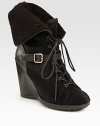 Dyed calf hair and leather wedge with a lace-up front, buckle detail and fold-over shearling cuff. Stacked wedge, 4 (100mm)Covered platform, ½ (15mm)Compares to a 3½ heel (90mm)Dyed calf hair and leather upperShearling liningRubber solePadded insoleMade in Italy