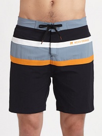 Classic fit swim style in a colorful wide stripe pattern with logo detail.Drawstring waistSide slash pockets48% modal/48% pima cotton/4% spandexMachine WashImported Classic fit swim style in a colorful wide stripe pattern with logo detail.Drawstring waistSide slash pockets48% modal/48% pima cotton/4% spandexMachine WashImported