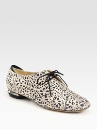 Lacy cutout details and a slight metal heel define this timeless suede and satin style. Metal and suede heel, ½ (15mm) 65% suede/35% satin upper Leather lining and sole Padded insole Made in Italy Lacy cutout details and a slight metal heel define this timeless suede and satin style. Metal and suede heel, ½ (15mm) 65% suede/35% satin upper Leather lining and sole Padded insole Made in Italy