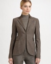 Wool Prince of Wales tweed, tailored in a classic menswear-inspired style, detailed with antique leather collar and turn back sleeves. Leather collarNotched lapelsTurn back leather cuff sleeve detail Clasp closuresFlap pocketsLinedAbout 26 from shoulder to hemWoolDry cleanImported of Italian fabricModel shown is 5'11 (180cm) wearing US size 4. 