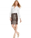 The sophisticated pencil skirt takes a walk on the wild side with this chic snake-print version from MICHAEL Michael Kors. A crisp white shirt and nude heels keep it perfectly polished for work.