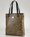 Get spotted shouldering this sleek silhouette by Lauren Ralph Lauren, featuring patent leopard print and signature detailing. Perfectly poised for toting laptop, eReader and favorite periodicals.