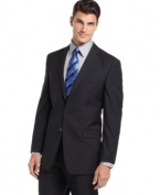 Bored with basic black? In a cool, crisp navy, this Calvin Klein blazer is change you've been waiting for.