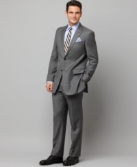 In sleek gray sharkskin, this Tommy Hilfiger suit gives your dress wardrobe an modern update.