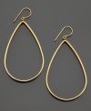 Take hoop earrings to a whole new level. These gorgeous open teardrop earrings are crafted in 14k gold. Approximate diameter: 1 inch. Approximate drop: 2-1/2 inches.
