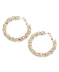 Dazzling by design. Alfani adds a glamorous touch to traditional hoop earrings with a chic, twisted design and sparkling glass accents. Crafted in gold tone mixed metal. Approximate diameter: 1-1/2 inches. Dazzling by design. Alfani adds a glamorous touch to traditional hoop earrings with a chic, twisted design and sparkling glass accents. Crafted in gold tone mixed metal. Approximate diameter: 1-1/2 inches.