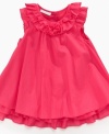 Simply sweet. Her natural beauty will shine through in this ruffly dress from First Impressions.