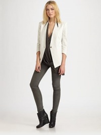 Architectural lines shape this impeccably tailored cropped blazer.Leather point collar insetV necklineThree-quarter sleevesSingle-button closureBodice dartsWelt pocketsBack vent at hemAbout 28 from shoulder to hem44% cotton/29% linen/21% ramie/6% elastaneDry clean by a leather specialistMade in USA of Italian fabricModel shown is 5'9½ (177cm) wearing US size 4.OUR FIT MODEL RECOMMENDS ordering true size. Architectural lines shape this impeccably tailored cropped blazer.Leather point collar insetV necklineThree-quarter sleevesSingle-button closureBodice dartsWelt pocketsBack vent at hemAbout 28 from shoulder to hem44% cotton/29% linen/21% ramie/6% elastaneDry clean by a leather specialistMade in USA of Italian fabricModel shown is 5'9½ (177cm) wearing US size 4.OUR FIT MODEL RECOMMENDS ordering true size.