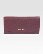 Supple leather in a classic continental design.Magnetic snap flap closureLogo emblemOne inside zip pocketTwelve credit card slotsTwo bill compartmentsLeather lining7½W X 4H X 1DImported