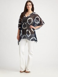 An airy design featuring a bohemian-inspired tie-dye print. The kimono sleeves are not only classically feminine, but they will also provide you with arm coverage.V-necklineKimono sleevesEmpire waistPull-on styleAbout 32 from shoulder to hemPolyesterHand washImported An airy design featuring a bohemian-inspired tie-dye print. The kimono sleeves are not only classically feminine, but they will also provide you with arm coverage.V-necklineKimono sleevesEmpire waistPull-on styleAbout 32 from shoulder to hemPolyesterHand washImported