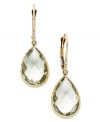 Take your look to the next level with the right amount of color. Pear-cut green quartz (10 ct. t.w.) adds the sparkle to these shining 14k gold earrings with diamond accents. Approximate drop: 1-1/4 inches.