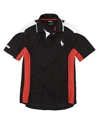 Rendered in soft-touch microfiber mesh, this ultra-breathable polo shirt features a bold color-block pattern for a stylish, athletic look. Rendered in soft-touch microfiber mesh, this ultra-breathable polo shirt features a bold color-block pattern for a stylish, athletic look.