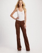 Add some vintage flare to your silhouette in fine-wale corduroy.THE FITMid rise Flare leg Inseam, about 35 Rise, about 9THE DETAILSZip fly Button closure Five-pocket style 76% lyocell/23% cotton/1% elastane Machine wash Made in USA of imported fabric