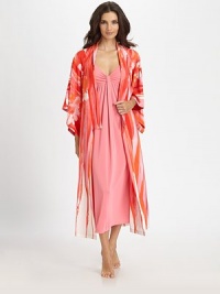 A floral watercolor print in vivid hues cascades down this silky-smooth layering piece. V-neckDropped shouldersThree-quarter length dolman sleevesSelf-tie waistAbout 49 from shoulder to hemPolyesterMachine washImported A floral watercolor print in vivid hues cascades down this silky-smooth layering piece. V-neckDropped shouldersThree-quarter length dolman sleevesSelf-tie waistAbout 49 from shoulder to hemPolyesterMachine washImported