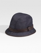 Denim fedora with braided leather trim. Embossed script logo Made in Italy 