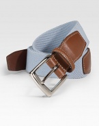 EXCLUSIVELY OURS. We've added a hint of stretch ease to a classic look, lending superior comfort to an all-season style. Kipskin tabs Nickle-plated buckle About 1¼ wide Made in USA 