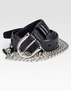 Shiny chain links and edgy stud detail defines this modern classic finished in rich Italian leather.LeatherAbout 1 wideMade in Italy