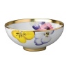 Pensees medium bowl by Bernardaud. This lively, luxurious collection is sure to transform your table into a celebration of spring. The floral watercolor pattern features delicate, multicolored pansies that appear to be strewn across the surface of each piece.