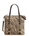 A zebra-printed straw tote with perfectly polished detail. This safari-chic style from Olivia + Joy features shiny goldtone hardware and edgy studded detail.