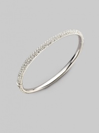 EXCLUSIVELY AT SAKS. Three rows of crystal impart their endless sparkle to a slender bangle, to wear alone or stack with others. Crystal Rhodium plated Diameter, about 2½ Hinged with push-lock clasp Imported Please note: Bracelets sold separately.