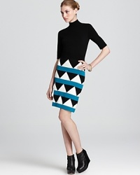 Make a mod statement in this geometric Milly knit dress with mock turtleneck and exposed back zip for a touch of luxe. Make a mod statement in this geometric Milly knit dress with mock turtleneck and exposed back zip for a touch of luxe.